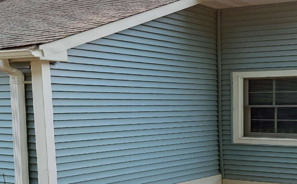 The same siding after soft washing by Property Washing Pros