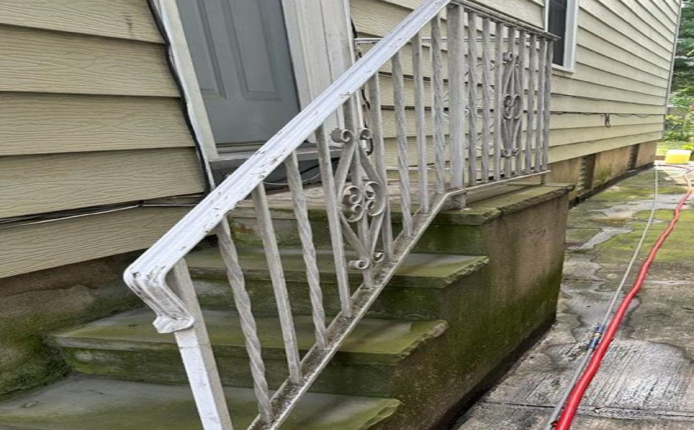 Concrete steps and walkway before cleaning by Property Washing Pros
